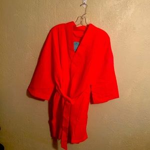 Robe looks pink but it is coral